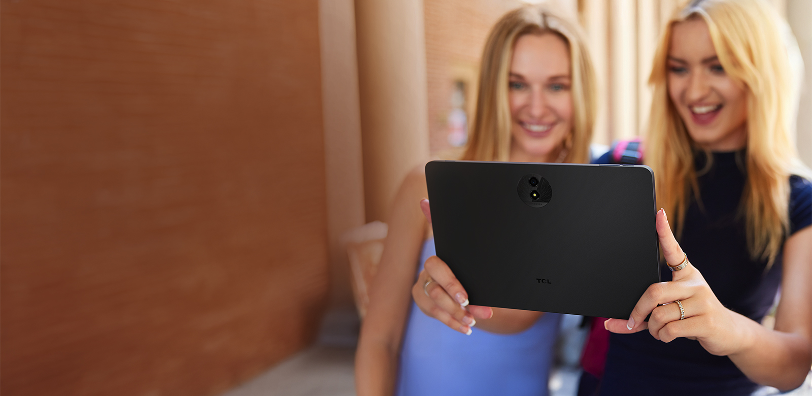 students streaming on tablet