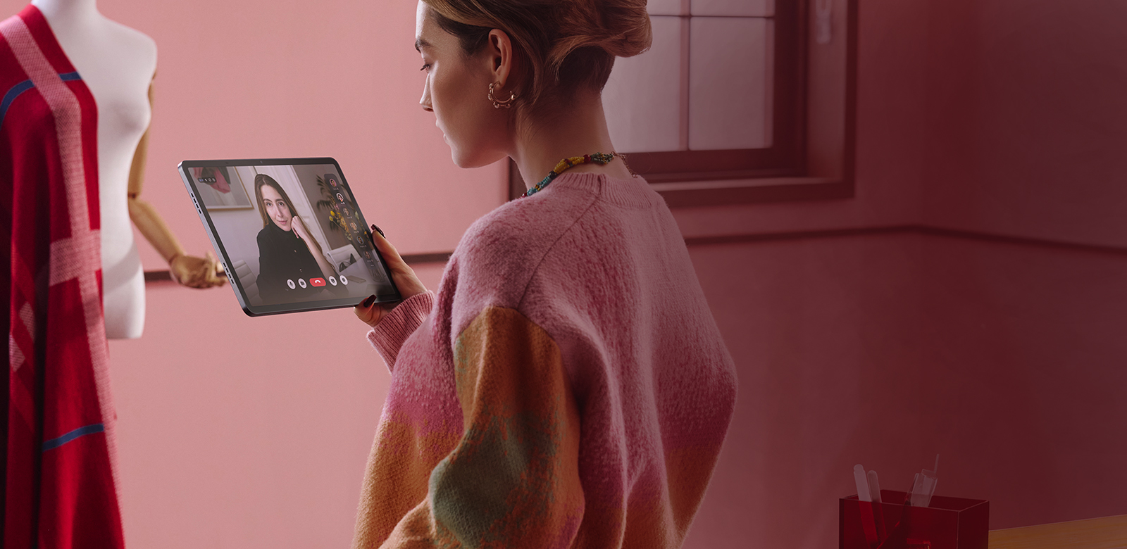 woman taking video call on tablet