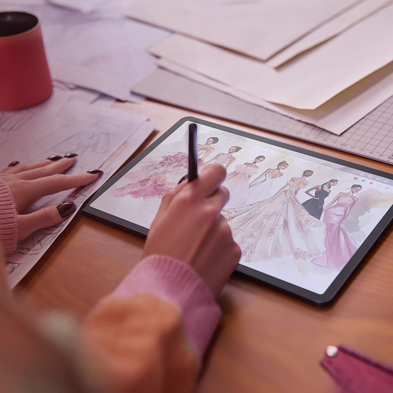 woman designing clothes on nxtpaper tablet