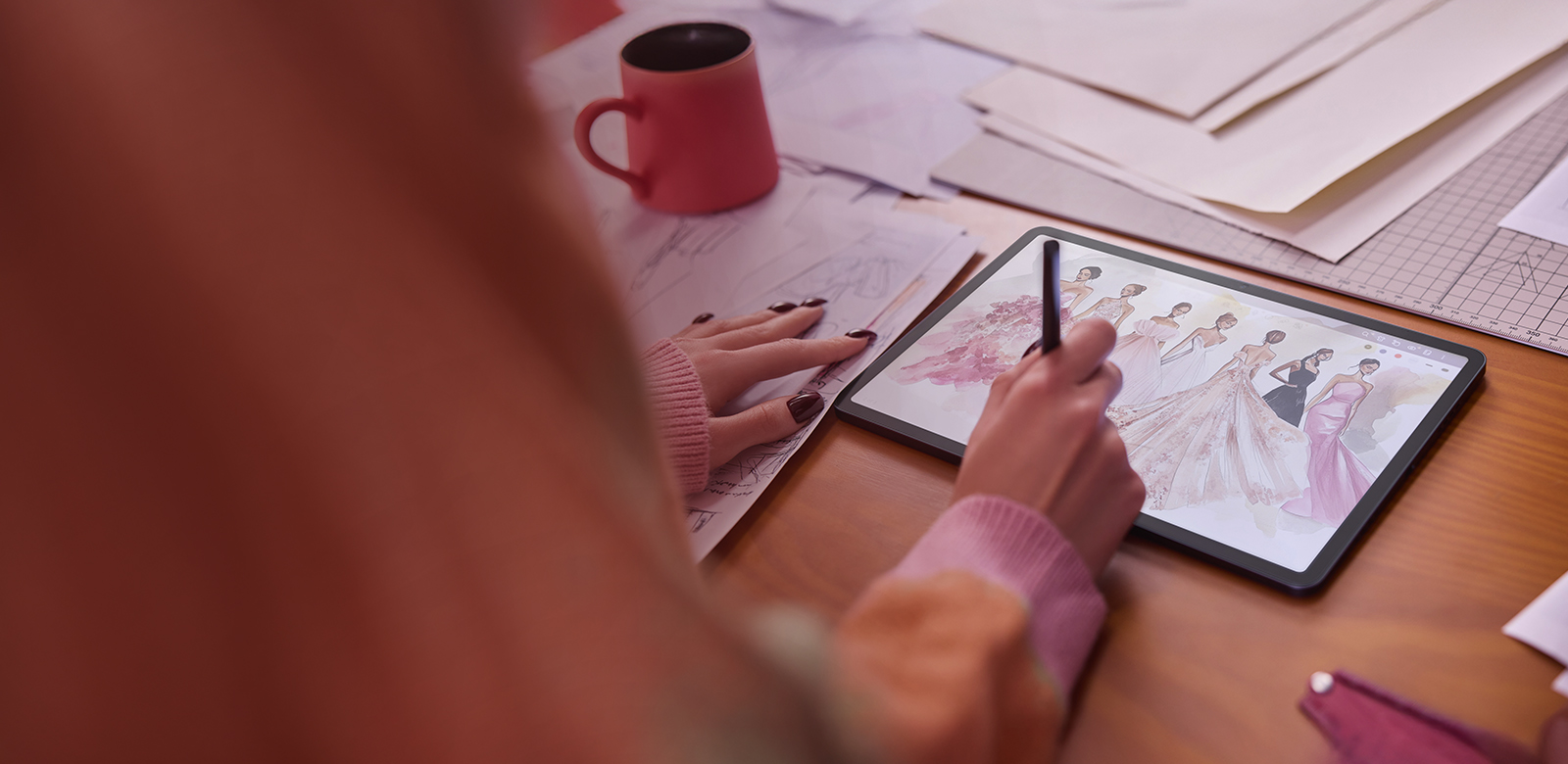 woman designing clothes on nxtpaper tablet