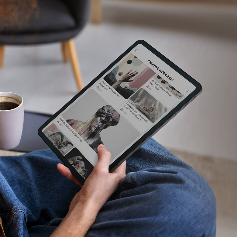 man holding tablet reading comic in nxtpaper ink mode