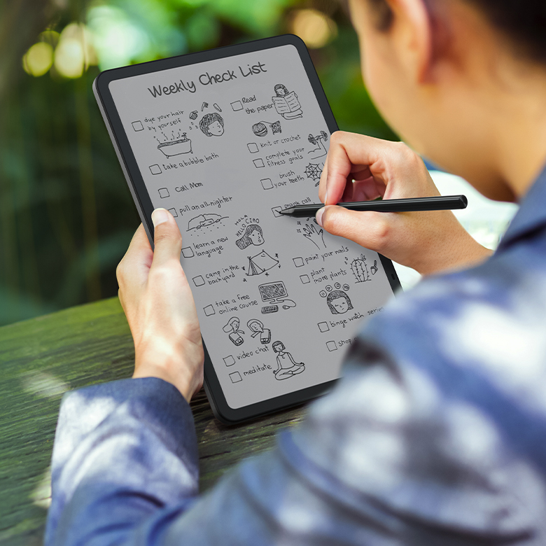 man taking notes on tablet throughout the day