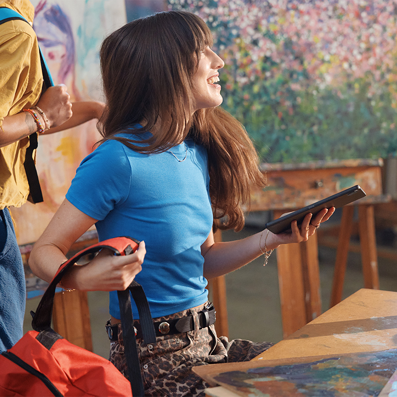 student using tablet on the go